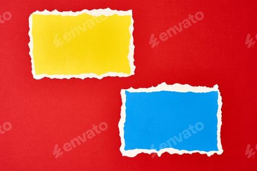 Preview: Two ripped paper torn edge sheets on a red background. Template with piece of color paper