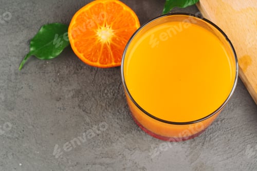 Preview: Still life of orange juice close up