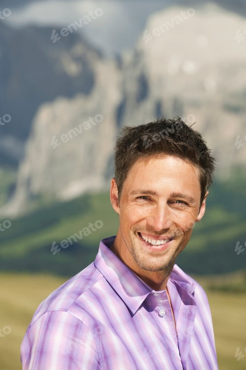 Preview: Italy, Seiseralm, Portrait of a man, smiling, close-up