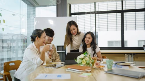 Preview: Group of Asian business people meeting, consulting and planning business on investment and market an