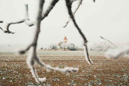 Preview: Small cemetery amid frozen landscape