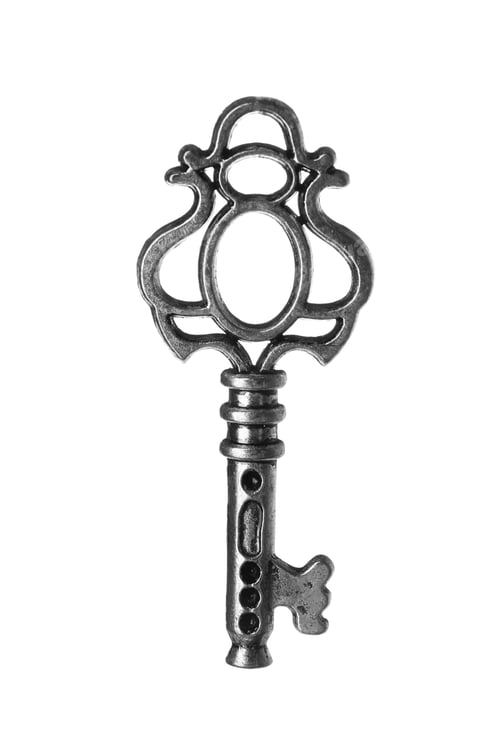 Preview: Steel vintage ornate key on white background
