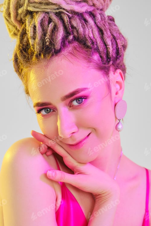 Preview: Woman with Dreads and Pink Makeup Posing