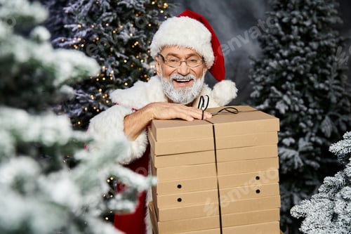 Preview: Santa Claus joyfully delivering gifts amidst a snowy forest during the festive season