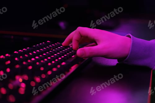 Preview: Close-up of a keyboard in neon color