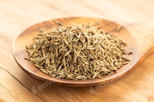 Preview: Cumin seeds on wooden spoon