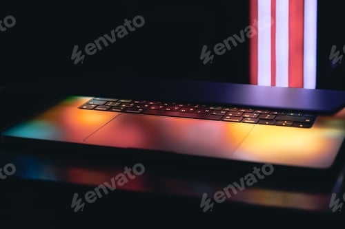 Preview: Close up of laptop keyboard colorful neon illumination, backlit keyboard.