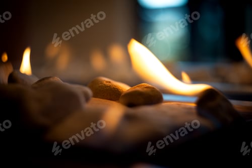 Preview: A fire burns in a glass fireplace, radiates heat