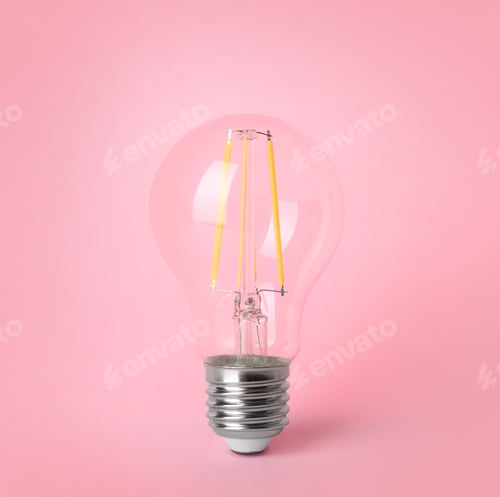 Preview: Vintage filament lamp bulb on pink background