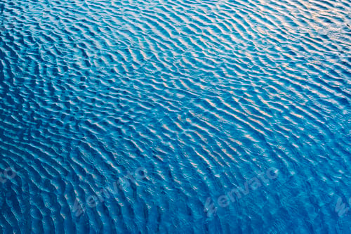 Preview: Abstract background from water wave in pool with sunlight.