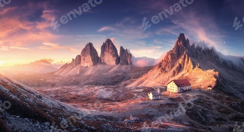 Preview: Mountain valley with beautiful house and church at sunset