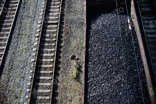 Preview: Coal wagon on the railroad, top view. Rails, train with raw materials