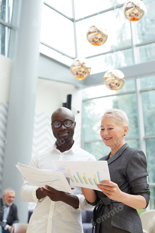 Preview: Business People Reading Report