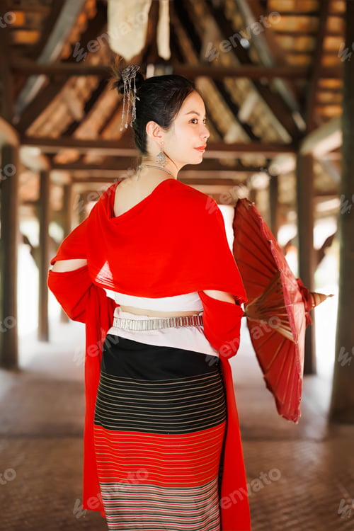 Preview: Northern Thai Chiangmai lanna style beautiful women with paper umbrella at wat ton kwen