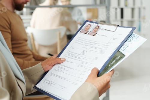 Preview: Holding Visa Application Form At Office