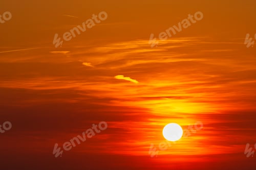 Preview: Background of colorful sky: Dramatic sunset with twilight color sky and clouds.