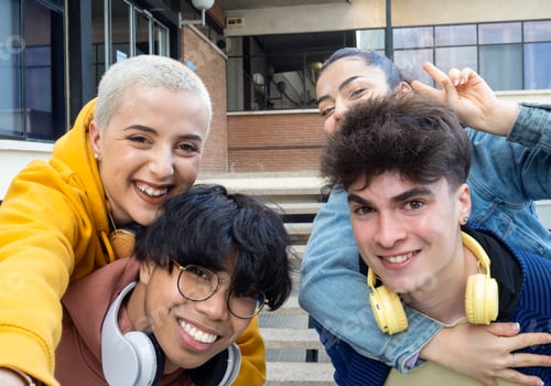 Preview: Group of young friends having fun. Cheerful young people smiling