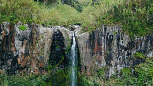 Preview: Huge waterfall streaming mountain aerial view. Water falling dangerous stones