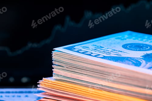 Preview: Dollars in front of a monitor with a price chart. Forex and trading