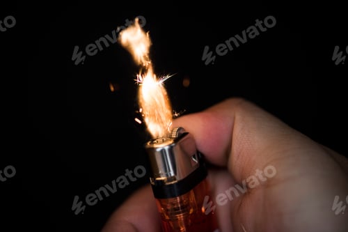 Preview: Macro shot of hand holding lighter