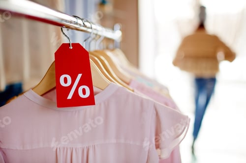 Preview: Discount Sale Clothing Rack in Retail Store