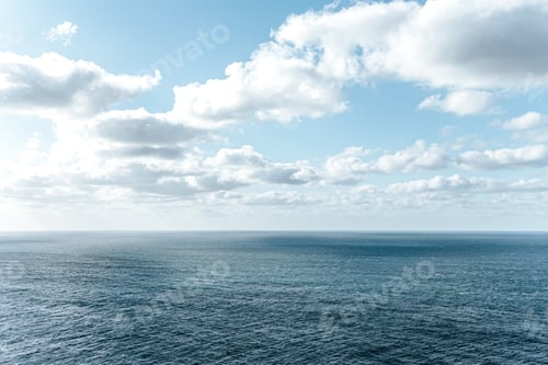 Preview: Crystal clear horizon of the ocean with white clouds with copy space, inspiration and freedom