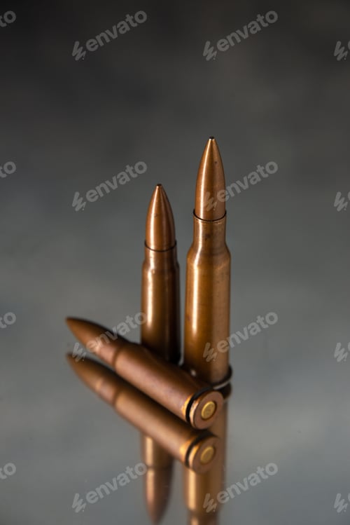 Preview: brown bullets on dark background gun tank death war shooting