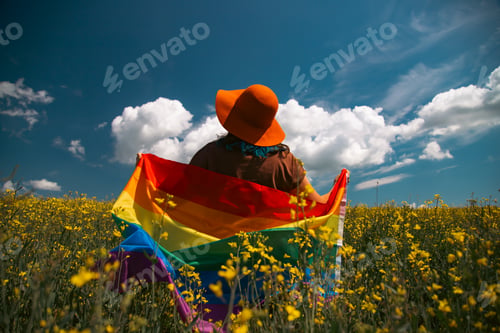 Preview: Young woman with LGBT flag.