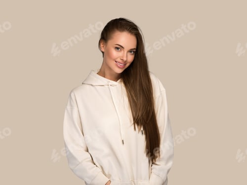 Preview: Woman portrait casual natural studio female long hair. Color background. Brown