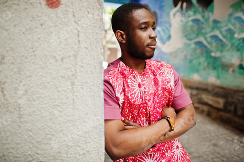 Preview: Black young man wearing african traditional clothes