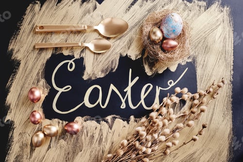 Preview: Overhead view of dyed and gold painted easter eggs and spoons with handwritten easter