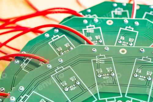Preview: Close-up of a large green microcircuit with blue components