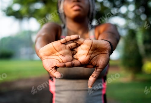 Preview: People stretching in a park