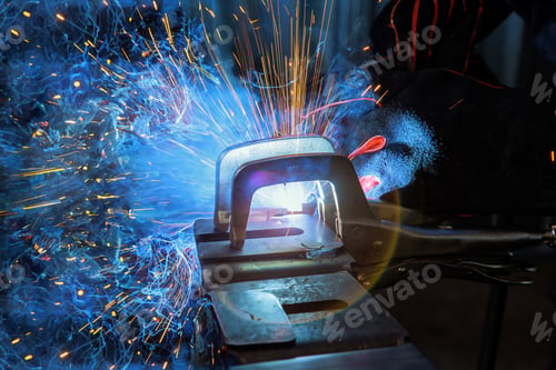 Preview: During welding using argon gas, sparks created by welding process produce smoke in a factory
