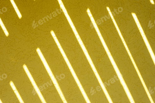 Preview: Yellow texture of the wall with a bark beetle pattern and light stripes. Summer bright sunny backgro