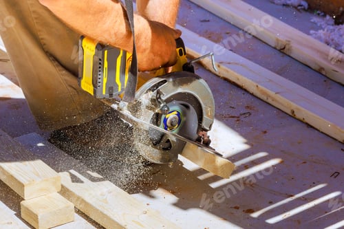Preview: Processing of woodworking carpenter cutting wooden beam using a handsaw