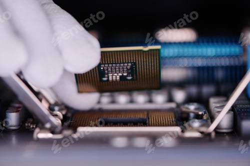 Preview: Unrecognizable Technician Installing New CPU Into Computer