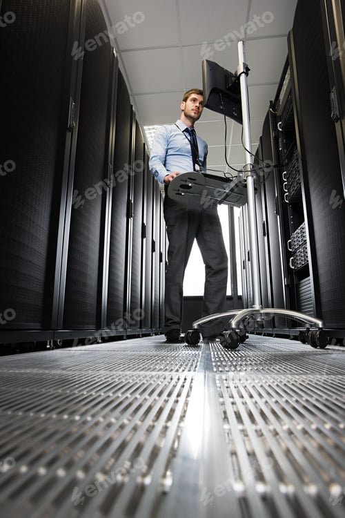 Preview: Computer technician working on a server