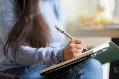 Preview: Female freelancer working at cafe