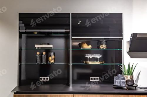 Preview: Part of a modern kitchen, a place for cooking, extractor and stove.