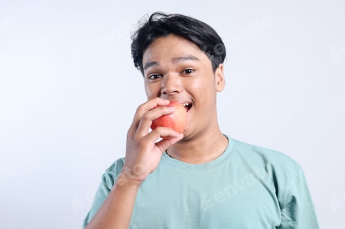 Preview: Young Man Eat Healthy Fresh Apple Fruit