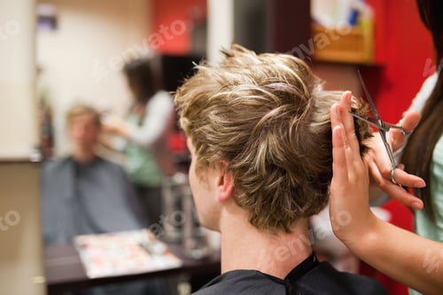 Preview: Blond-Haired Man Having A Haircut With Scissors
