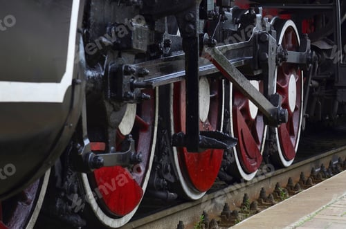 Preview: Red wheels of steam train