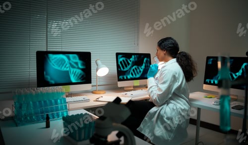 Preview: Scientist analyzing DNA structure in laboratory technology