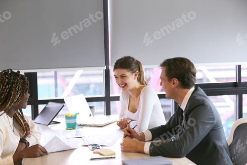 Preview: Shot of a group of businesspeople in a meeting at work