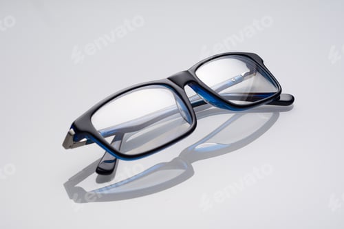 Preview: dark blue glasses on a white specular background