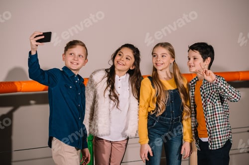 Preview: Group of preteen friends making selfie with smile