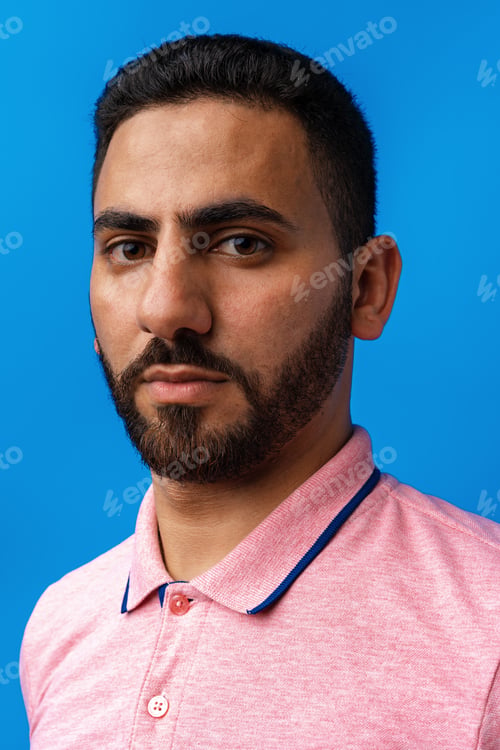 Preview: Close up portrait of young arab man in studio