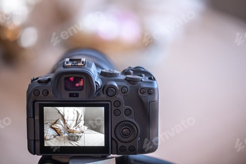 Preview: Close up of the screen of a professional digital camera on a tripod copy space.
