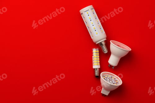Preview: LED light bulbs on red background top view